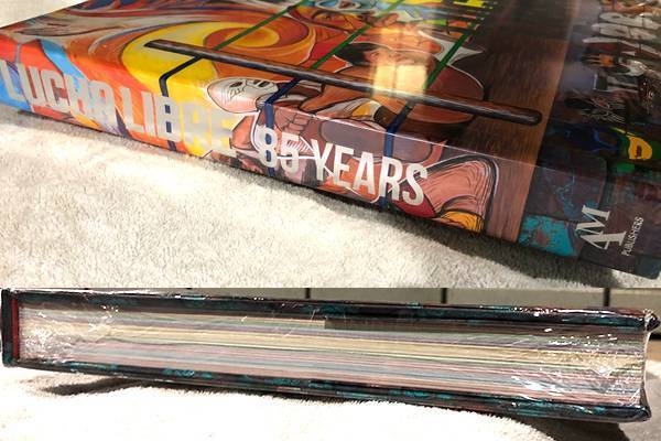 新日本プロレス　サイン入りコインケース　ドラゴン・リー　 Tシャツ・メモ帳・フィギュア・コインケース・キャップ・マスクが到着