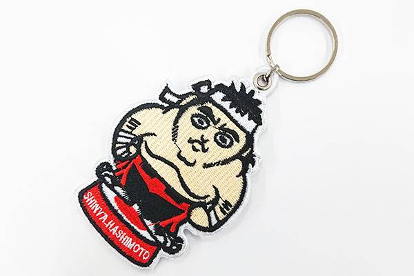 シンニチイズム大阪】7月9日から橋本真也選手のグッズ2種を特別